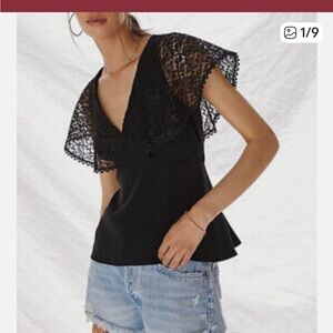 Anthropologie Sachin
+ Babi
Black Lace-Trim Blouse
